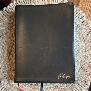 Bible (Black matte leather) with over 1,800 pages.